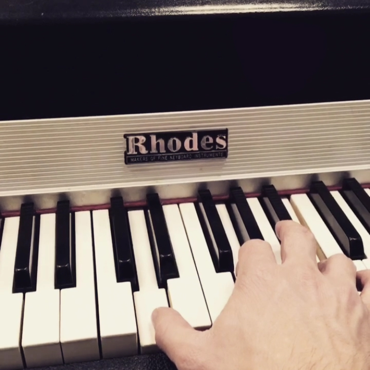 I'm playing the main motif on a real Rhodes